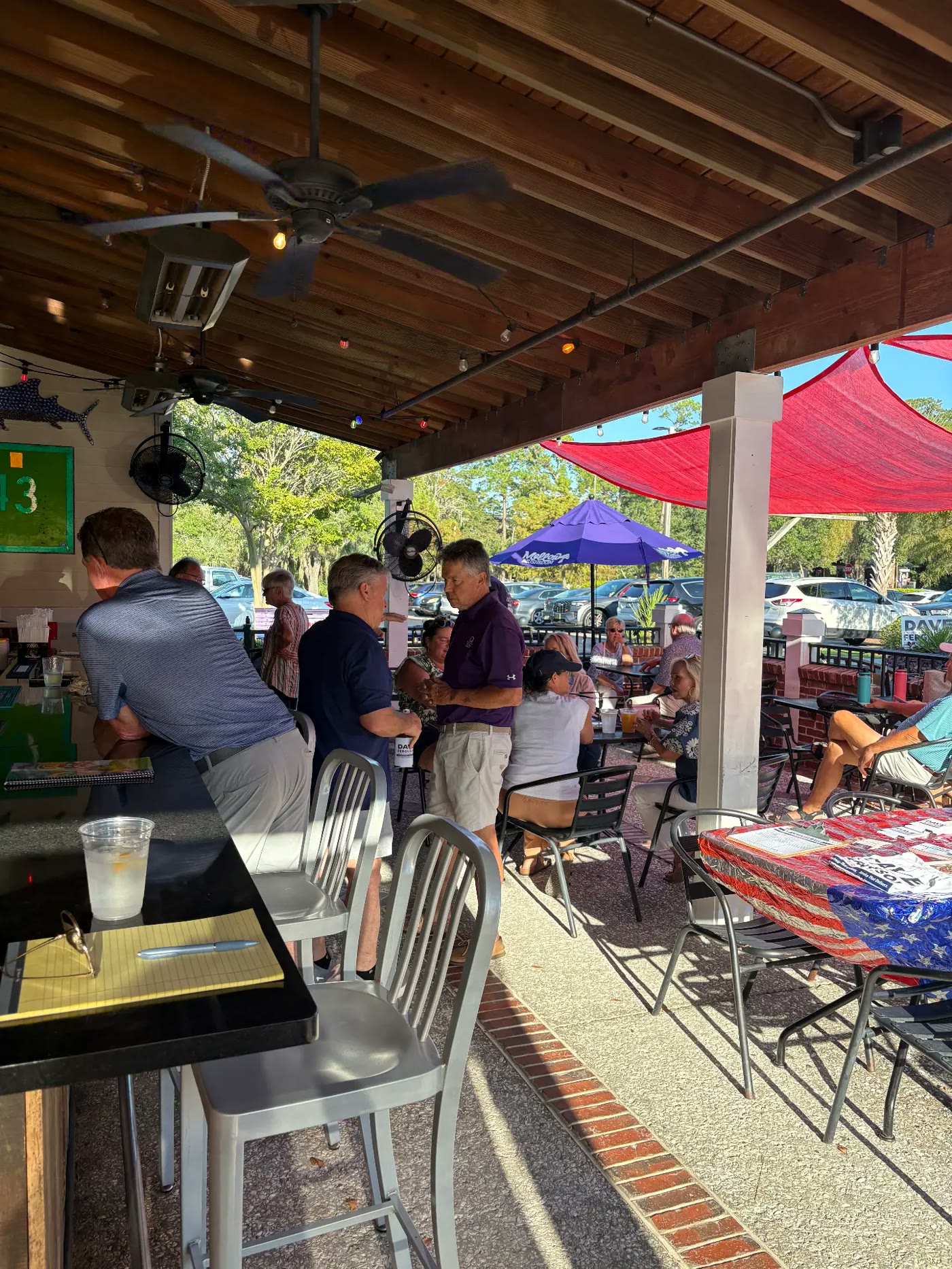 Residents gathered on a patio for a Dave Ferguson meet and greet