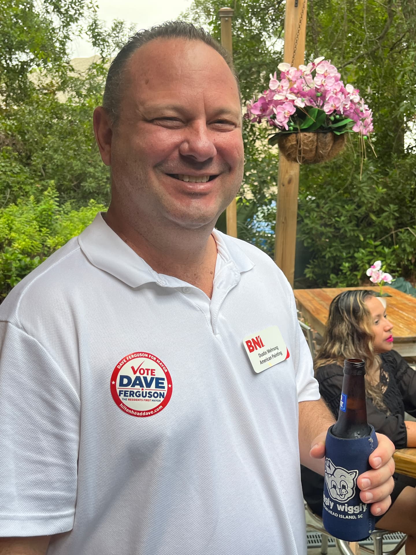 A supporter wearing a Vote Dave Ferguson sticker
