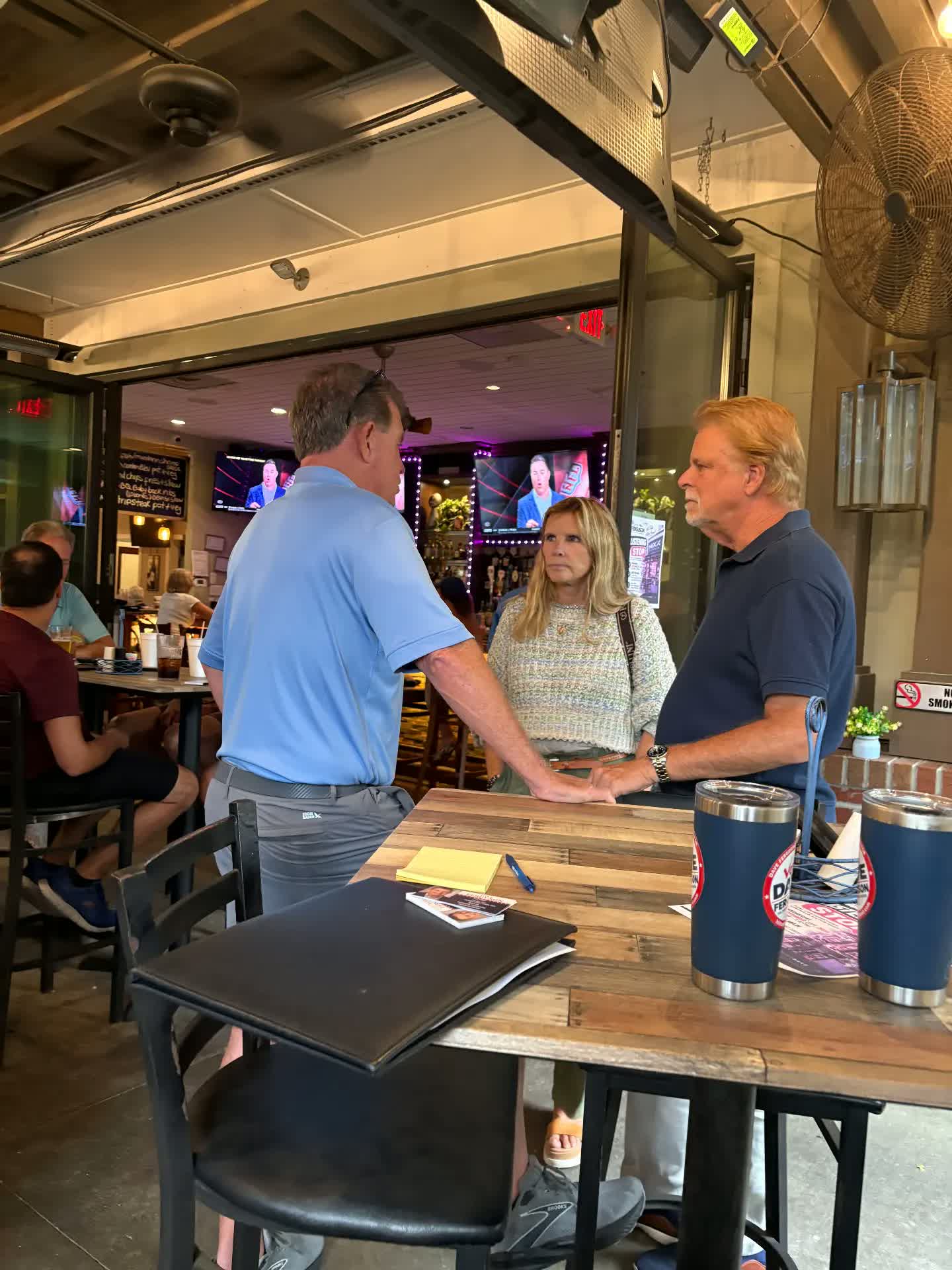 Dave Ferguson meeting a couple at a meet and greet