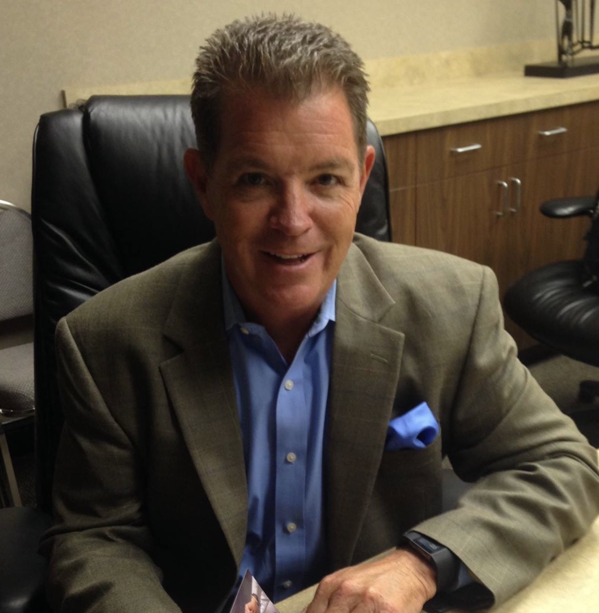 Dave Ferguson at his desk